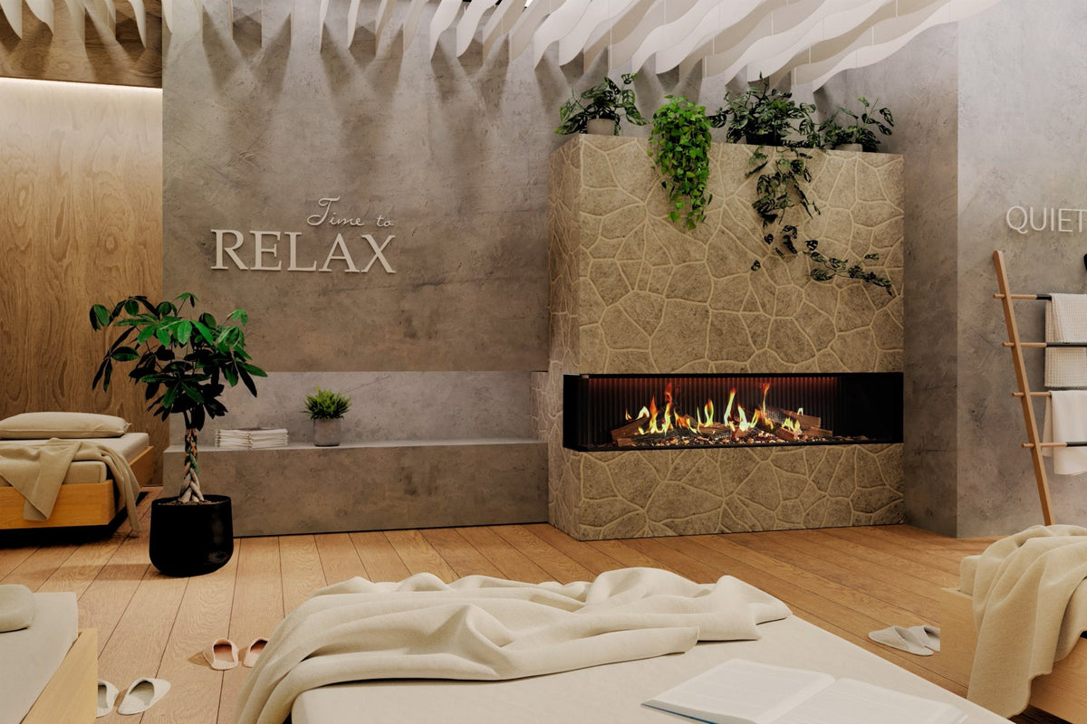 Șemineu electric DRU Virtuo 180/2 Evolve, varianta stânga (geamul lateral în stânga), într-un bloc placat cu piatră naturală, într-o zonă de relaxare de spa